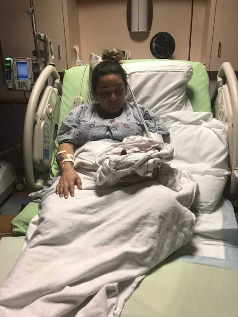 Grieving mom holds stillborn baby in hospital