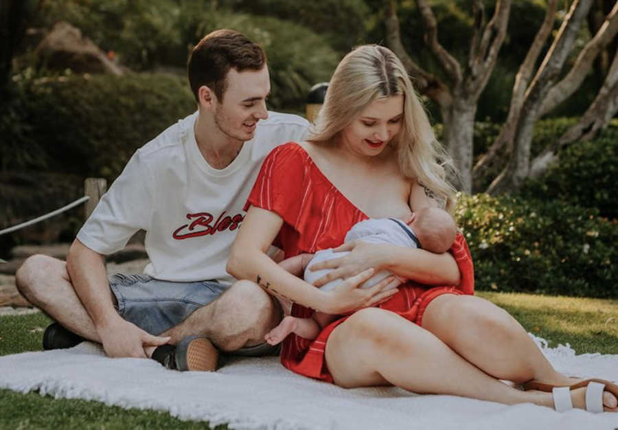 photo of couple with baby