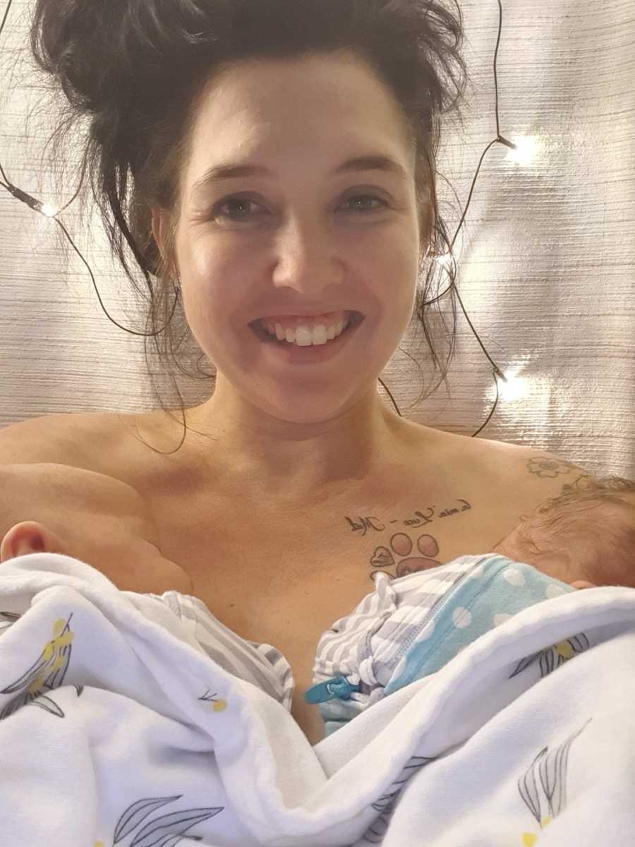 mom smiling with her twins