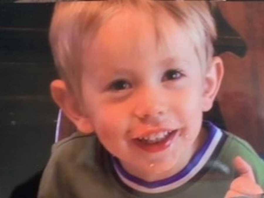 Boy with cerebral palsy smiling