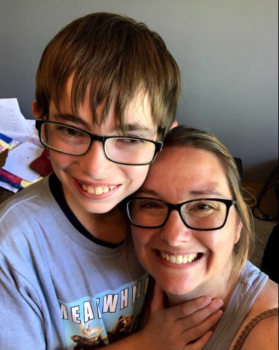 Mom and son smiling