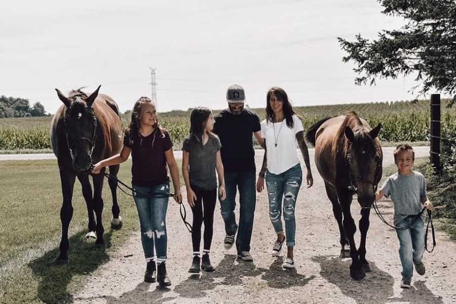 Family photo riding horses