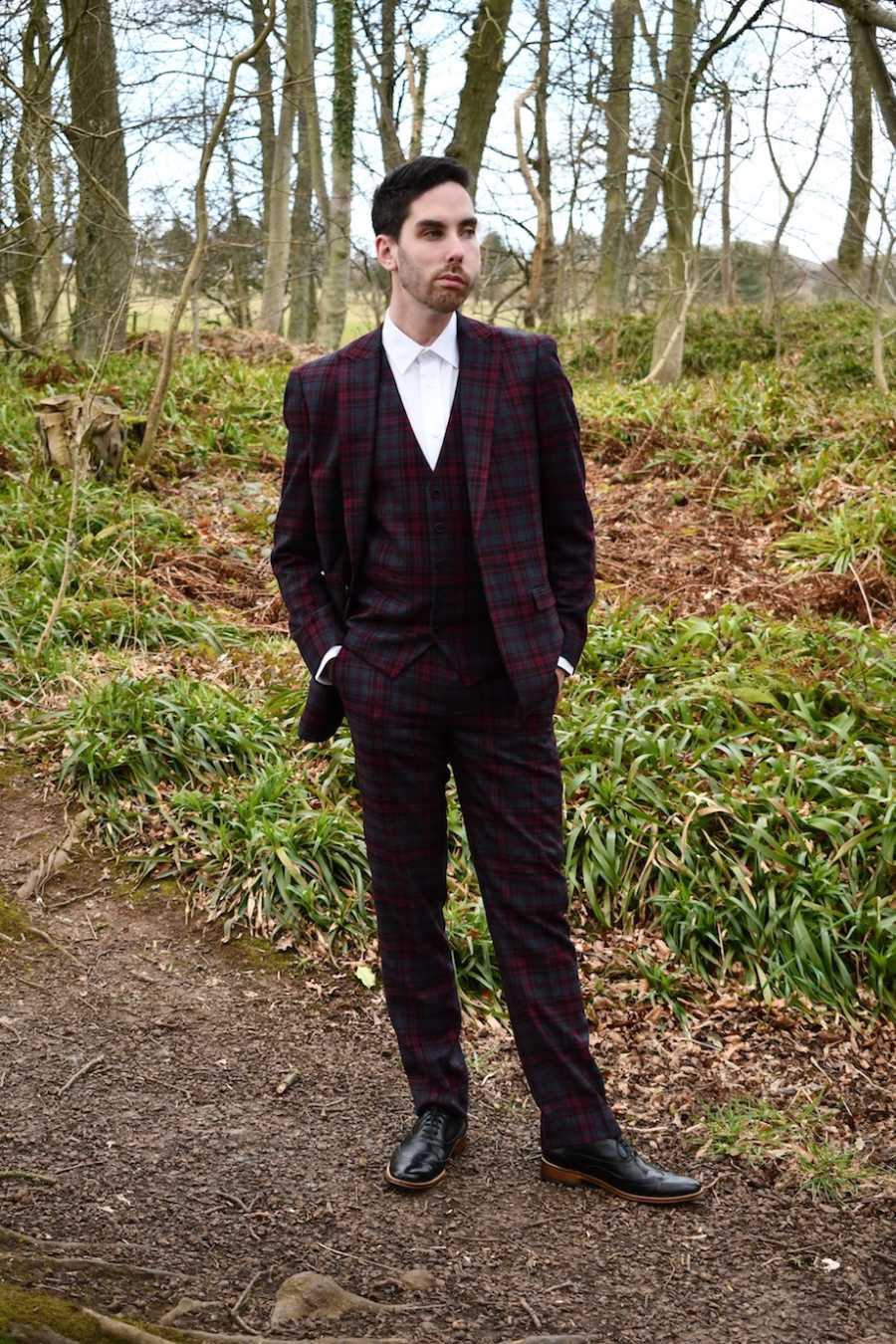 Man posing in suit