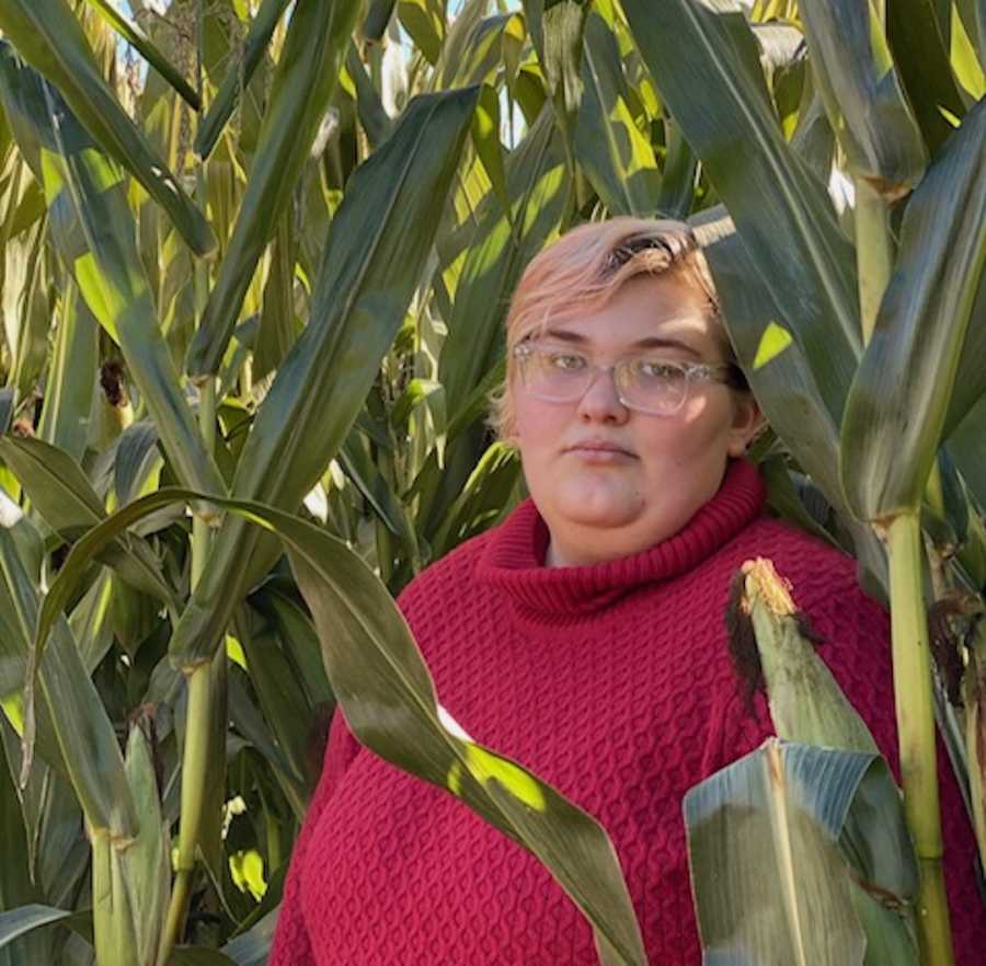 Woman posing in field