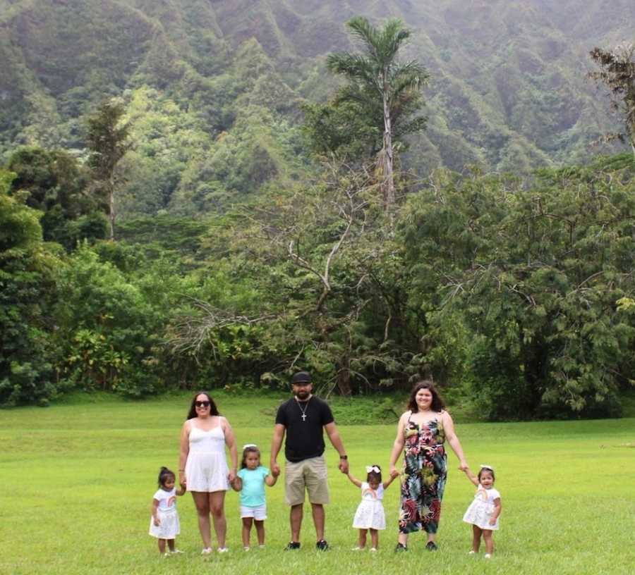 Family photo with five daughters, triplets