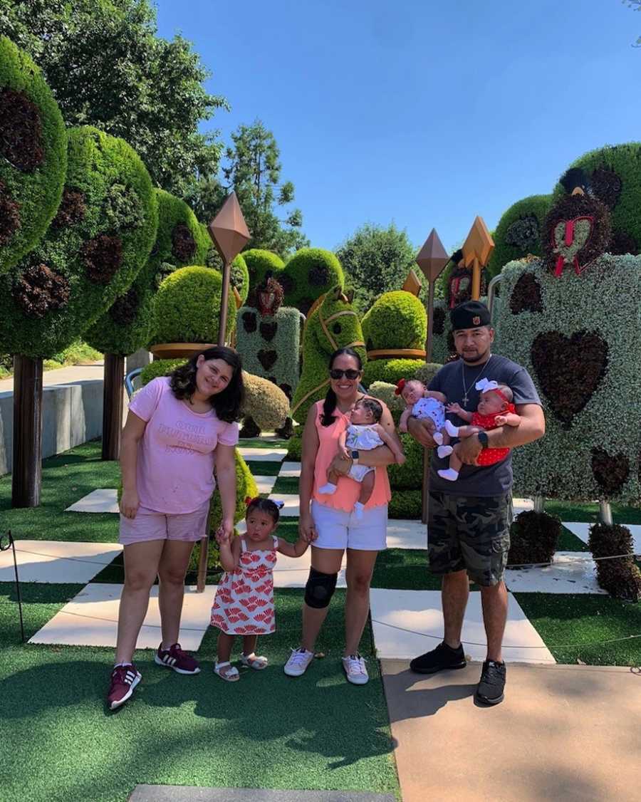 Family photo at Disney with triplets