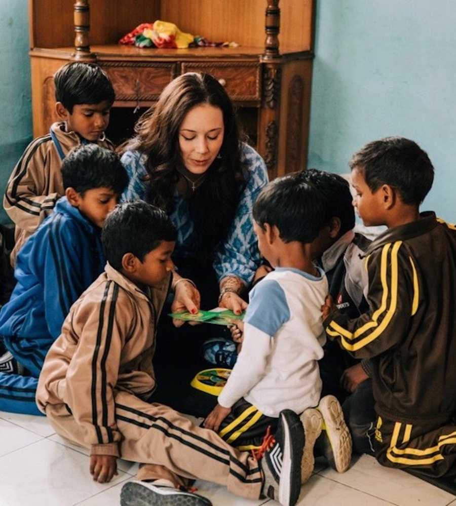 Mom playing with adopted children