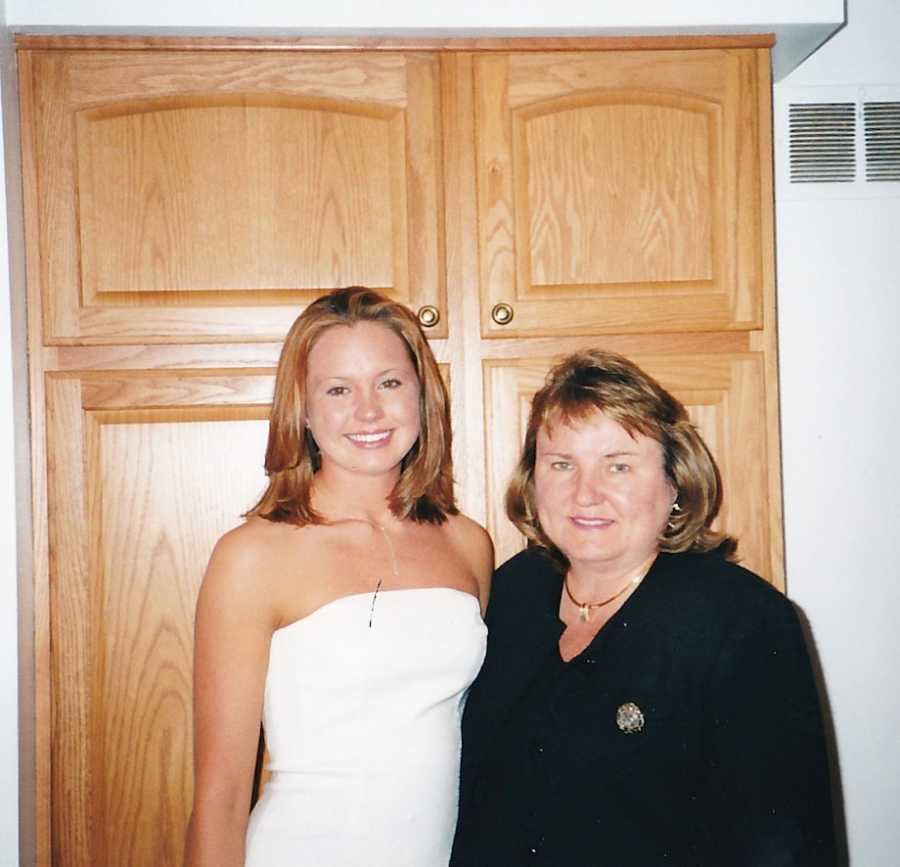 Teen with mom wearing prom dress