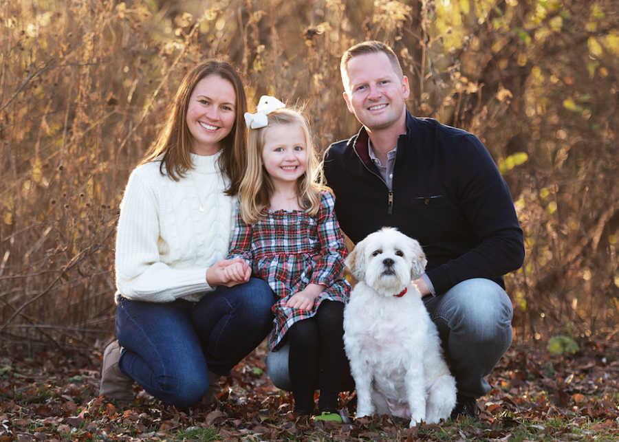 Family photo with pet dog