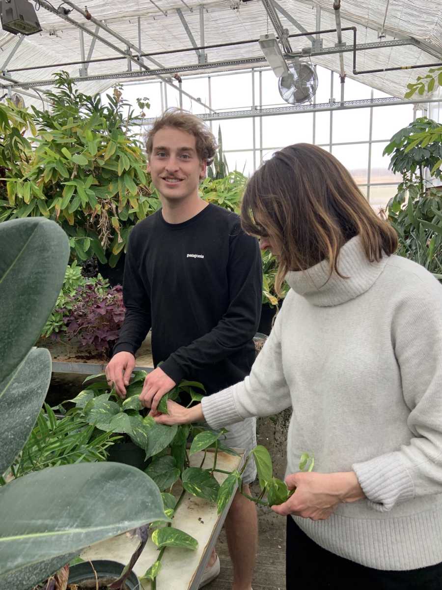 siblings in greenhouse