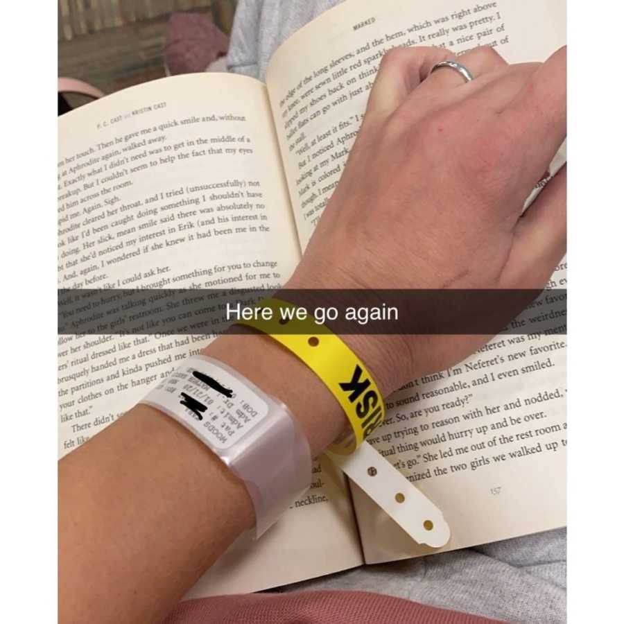 woman's wrist with hospital bracelet