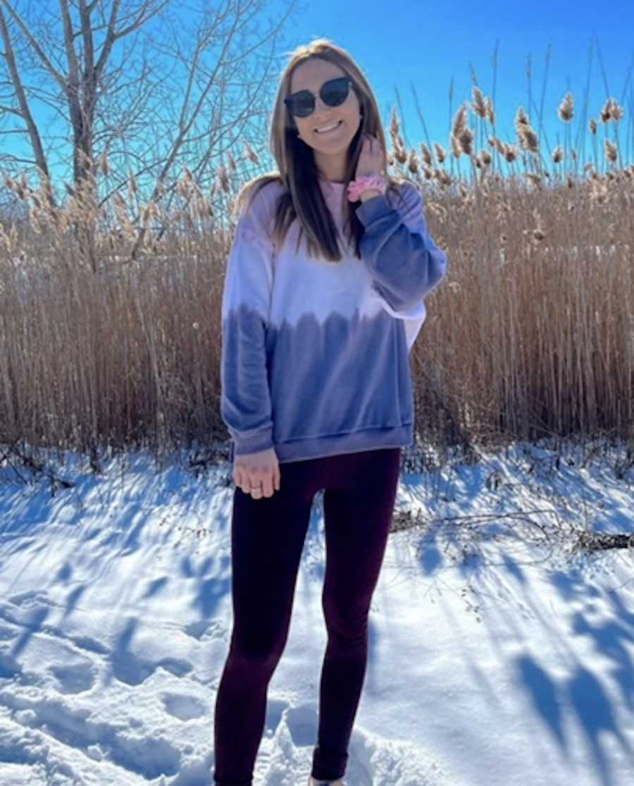 girl standing outside in snow