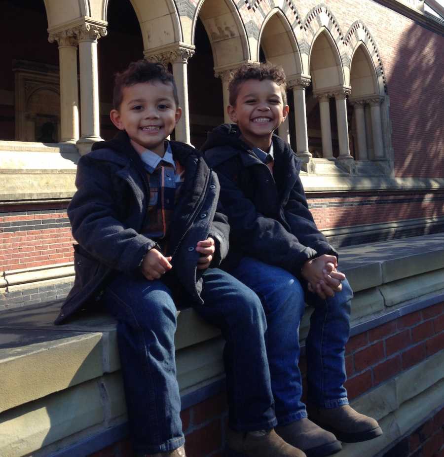 brothers sitting outside