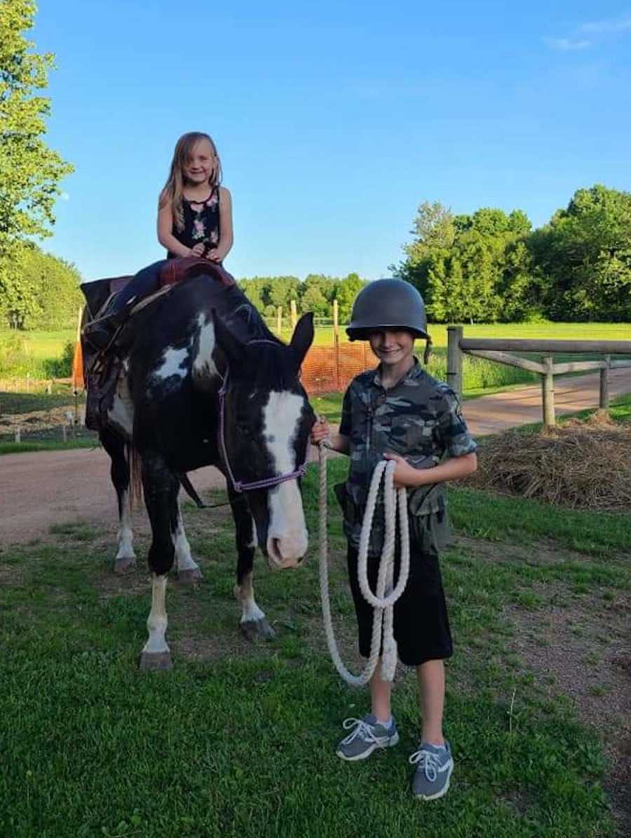 sister on horse with brother