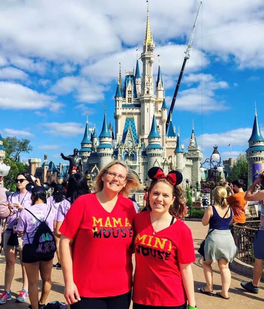 Mother and daughter wearing red shirts at Disney World