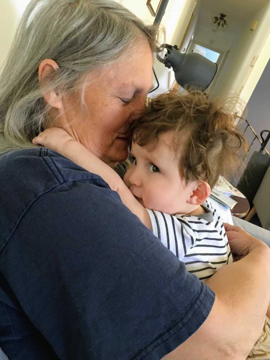 Grandmother holding grandson