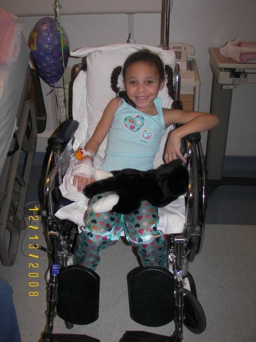 Little girl in wheelchair at hospital 