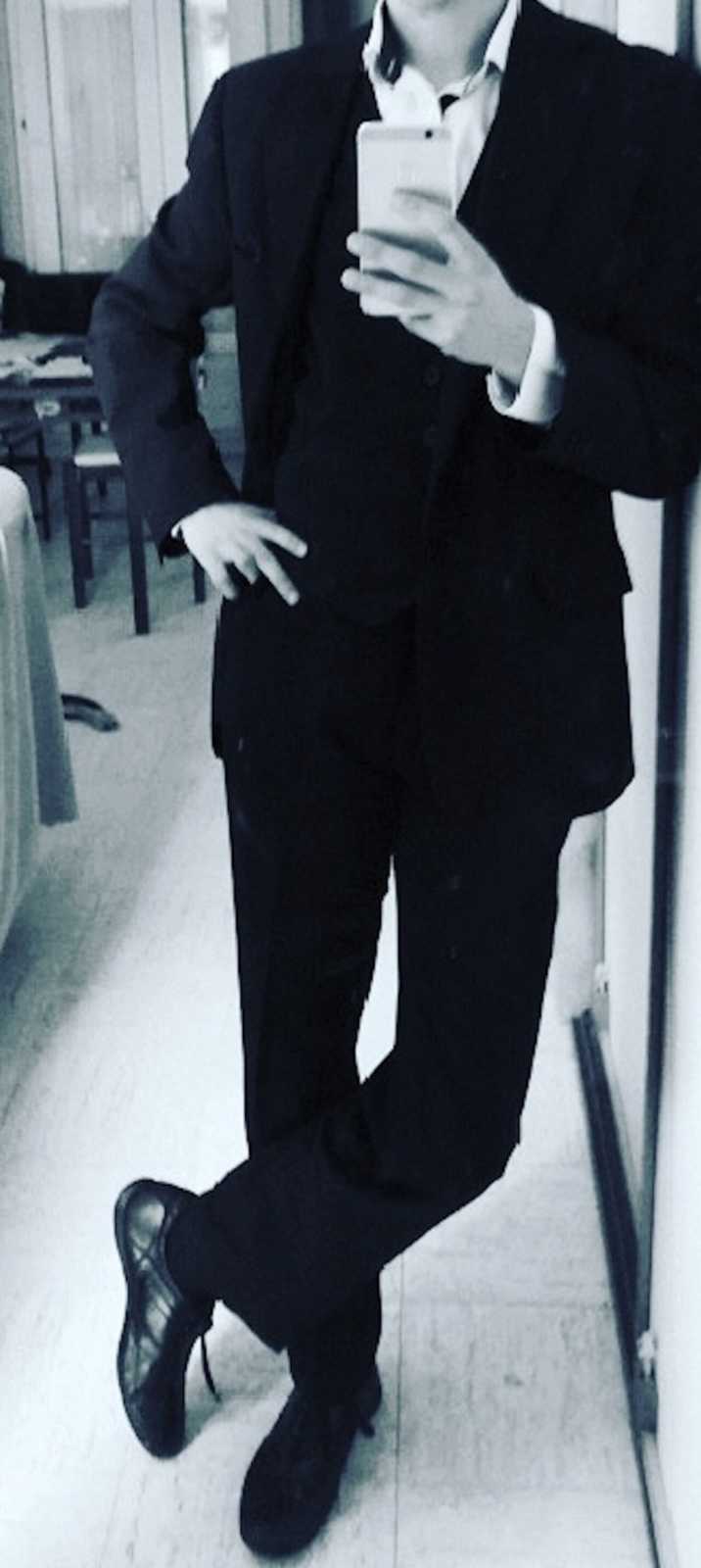 transgender woman in a suit