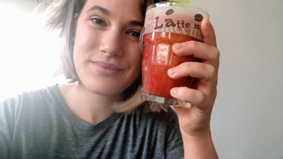 Woman with Epstein-Barr Virus takes a selfie with a smoothie