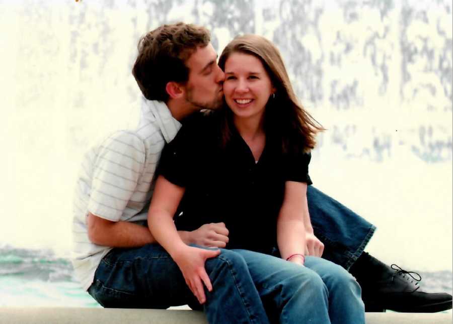 Newly engaged couple smiling