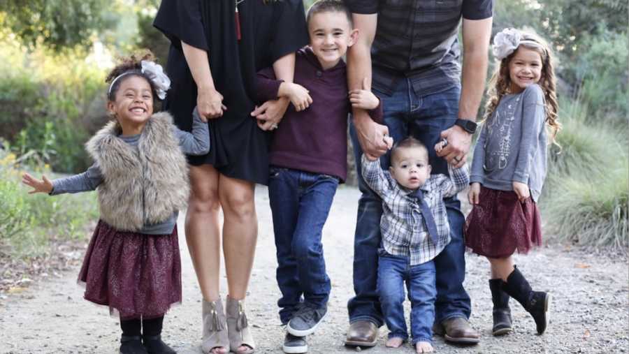 family with children smiling