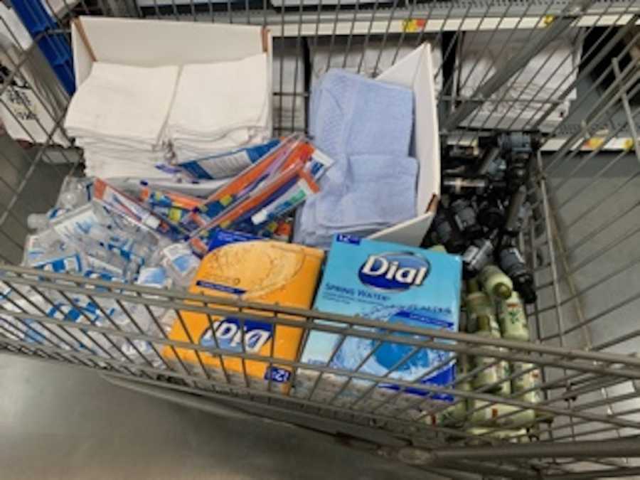 soap, sanitary products, toiletries in shopping cart