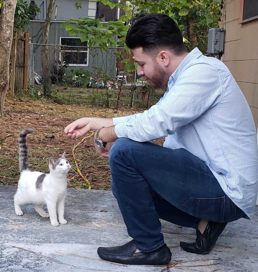 man with a cat