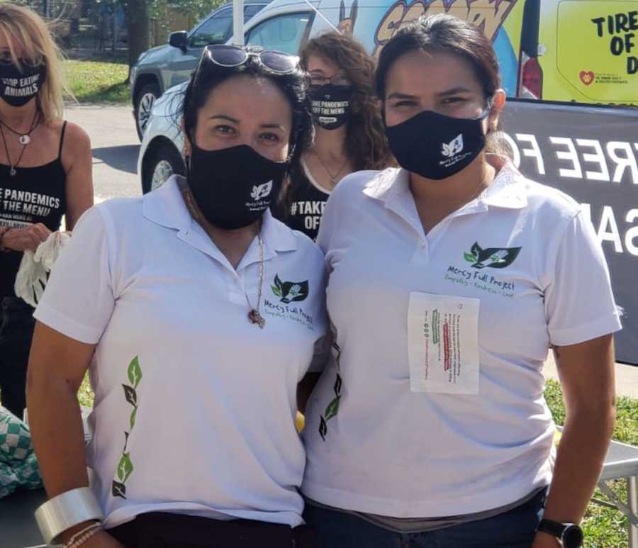 2 girls in masks 