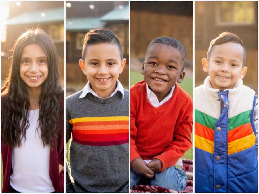 Four siblings smiling together