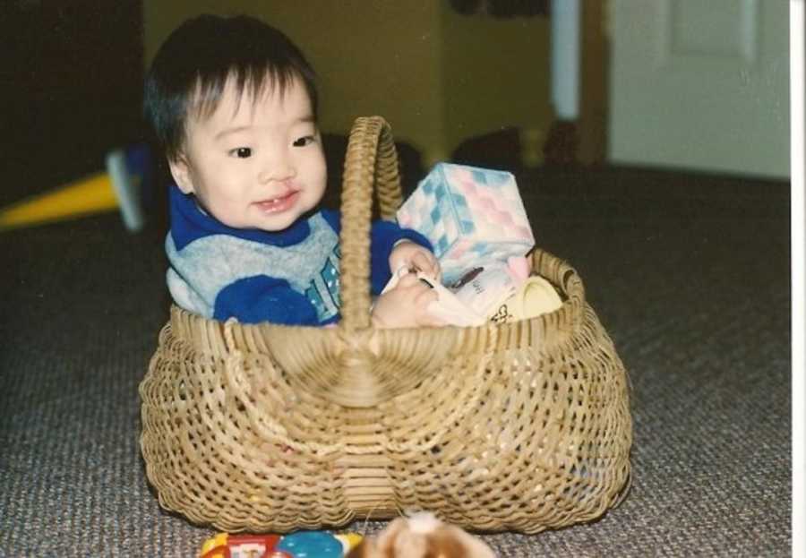 baby boy in basket