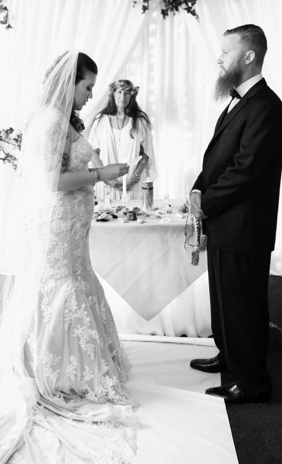 Bride and groom at altar during wedding