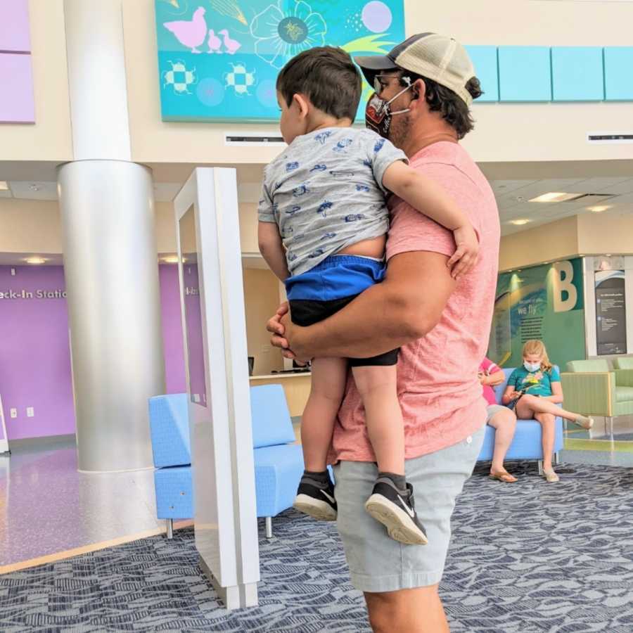 Foster dad holding foster boy