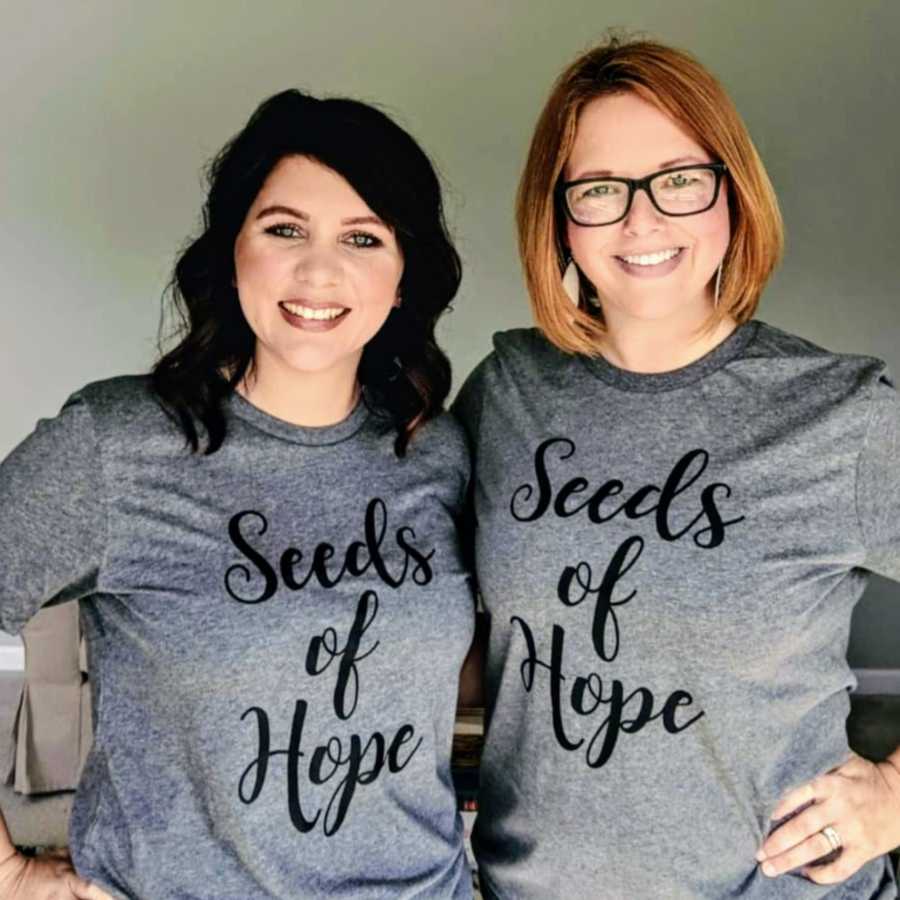 Two foster moms smiling about nonprofit