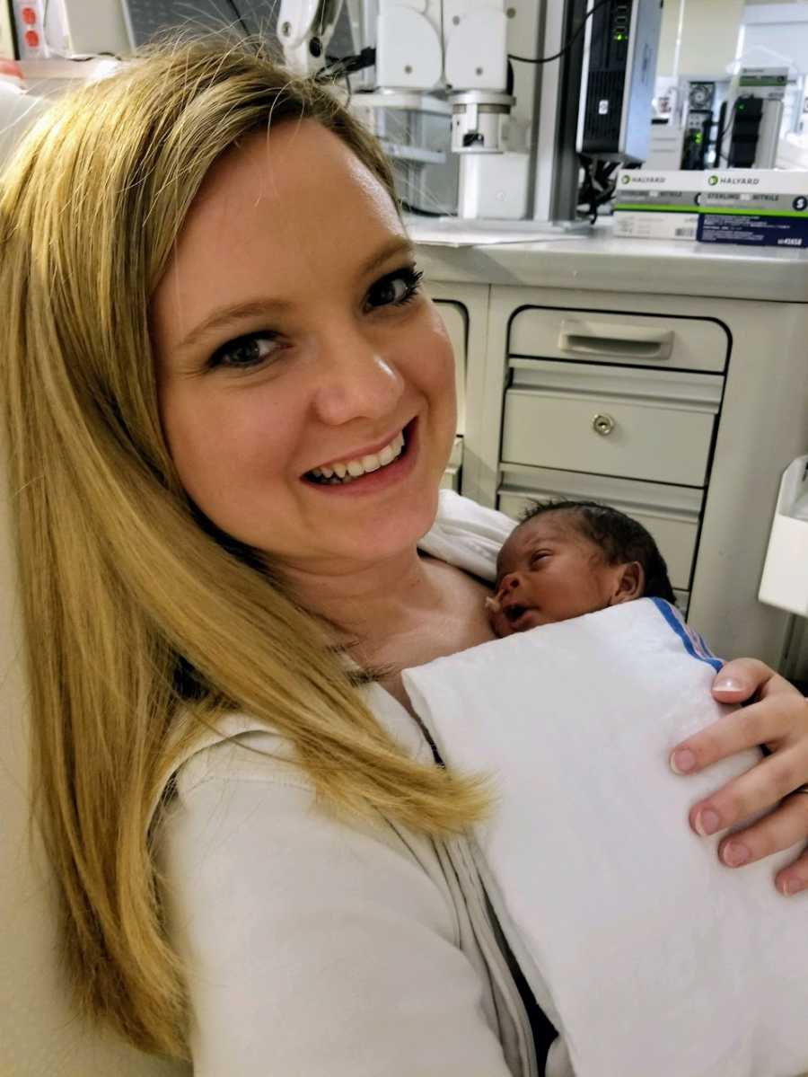 A new adoptive mom in the hospital with her son