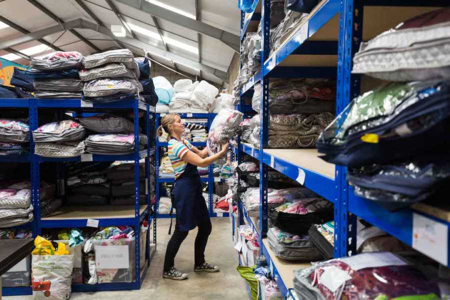 woman stocking shelves