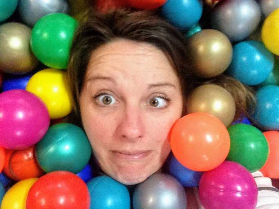 Woman in ball pit