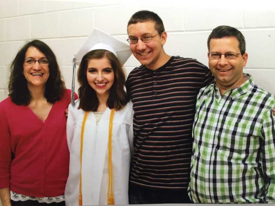 girl in white college graduation cap and gown