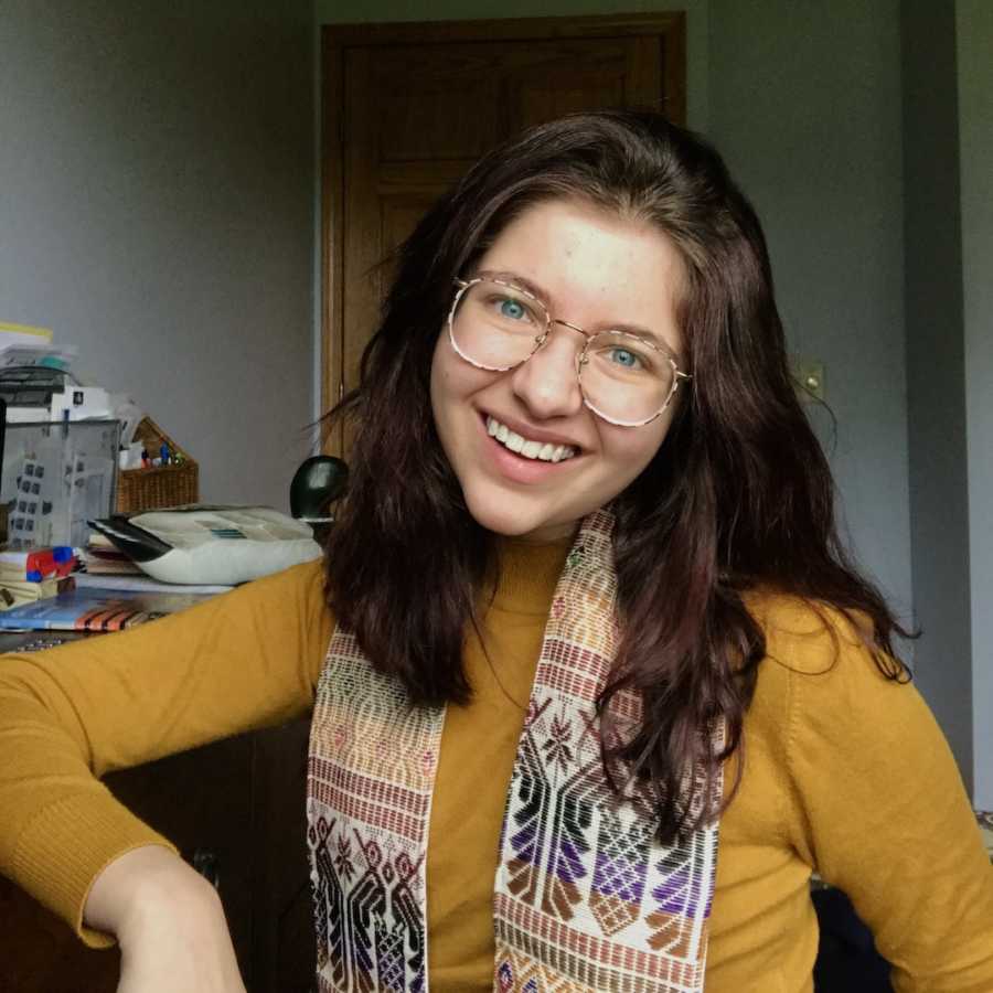 girl smiling in glasses