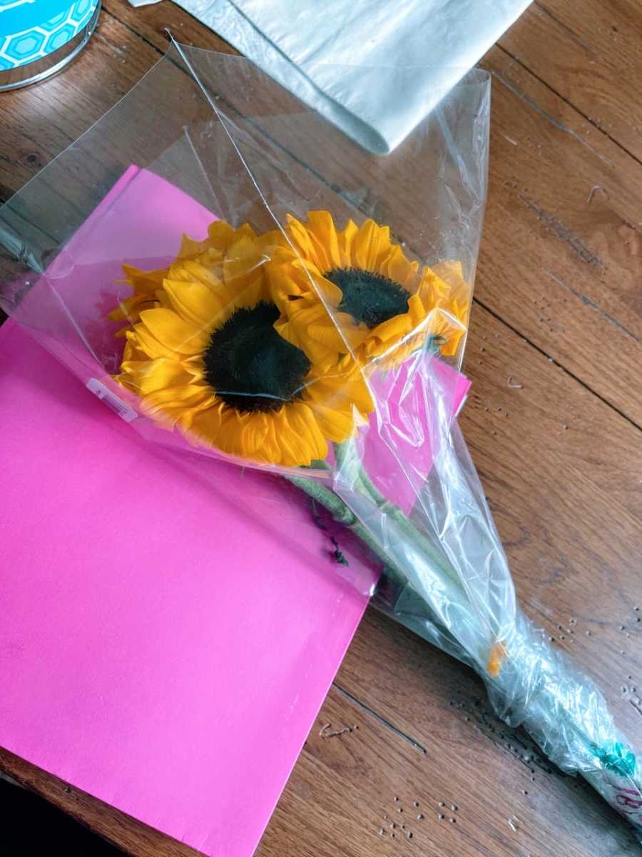 Woman battling cancer receives sunflowers and get well soon pictures from her son's bus