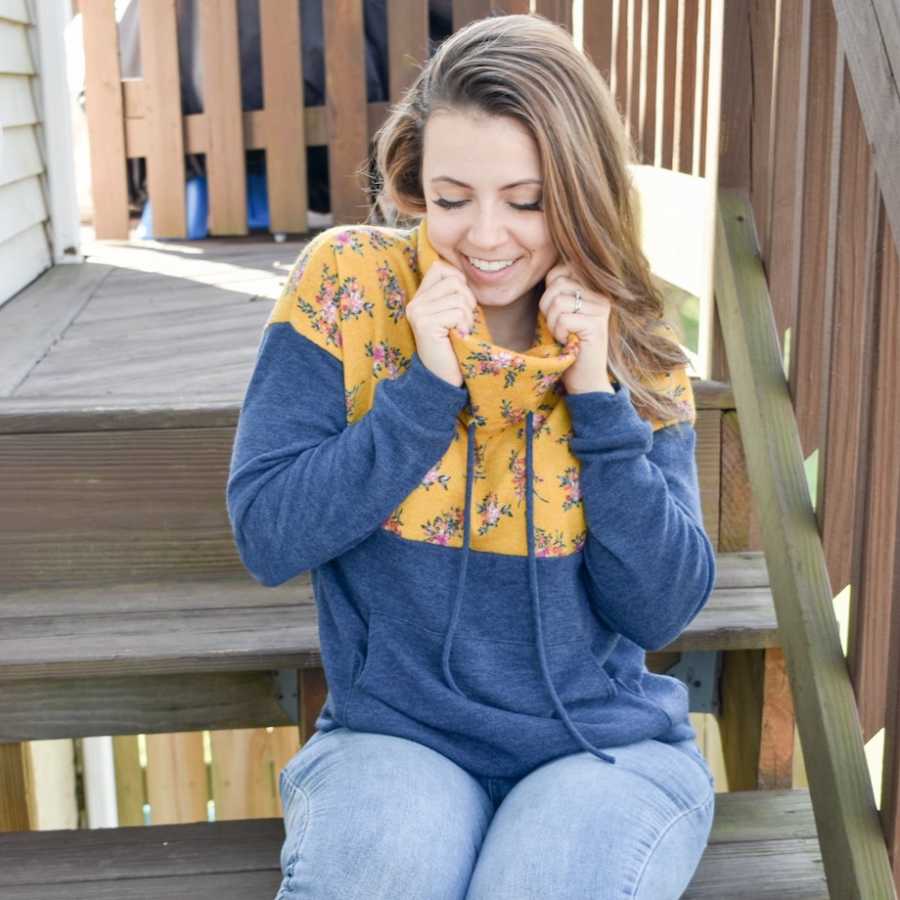 Woman smiling in blue jacket