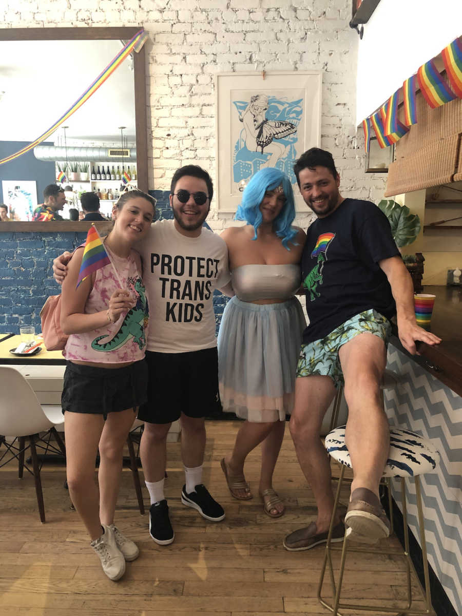 photo of friends- protect trans kids, rainbow apparel