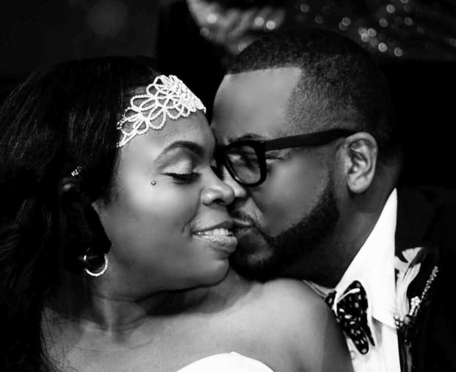 Couple share intimate moment during their wedding photoshoot