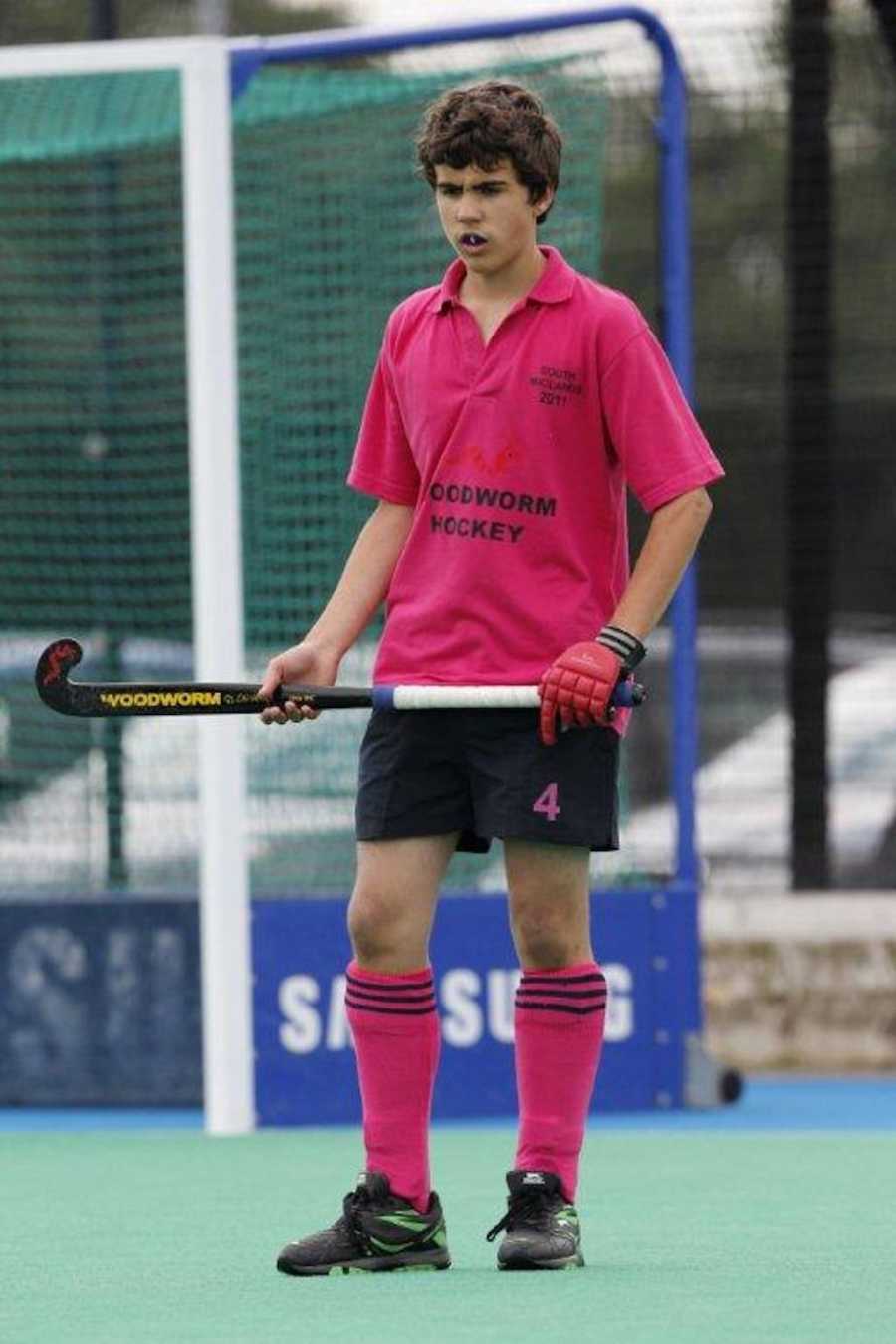 Teen playing hockey