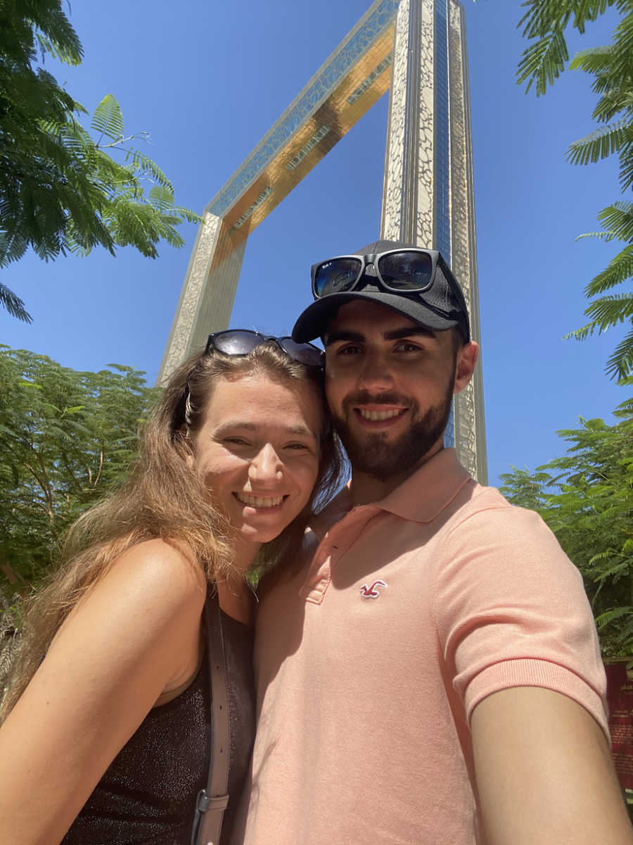 Man posing with girlfriend