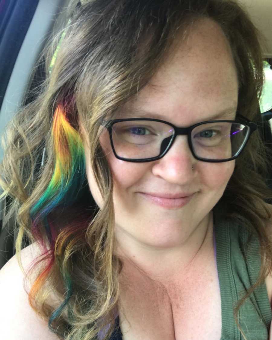 woman with rainbow streak in hair