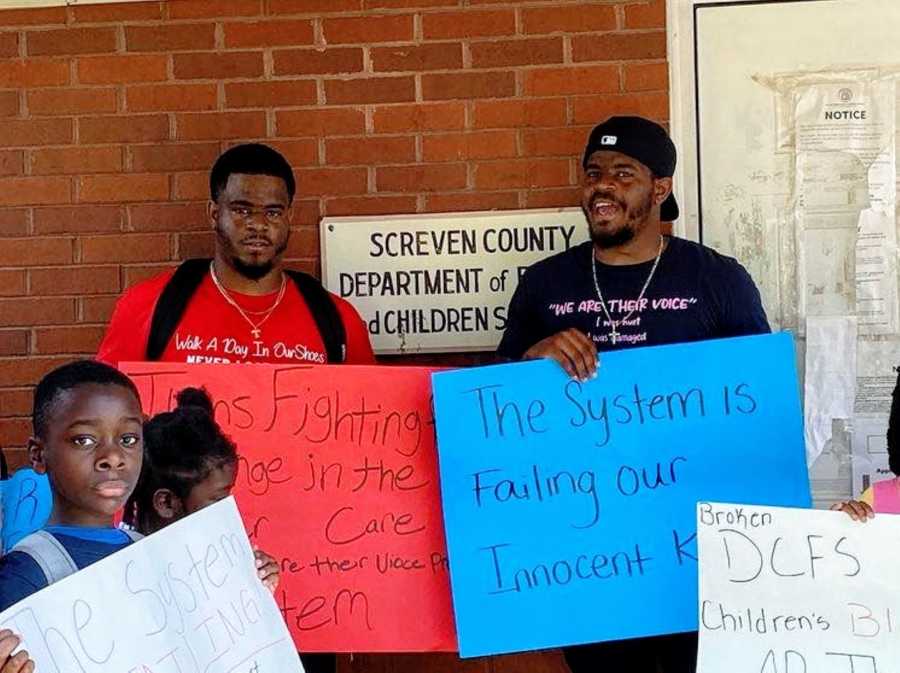 Twin brothers protest against the broken foster care system