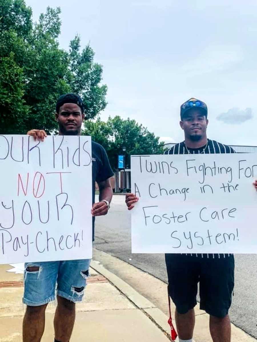 Adopted twin brothers protest against the foster care system