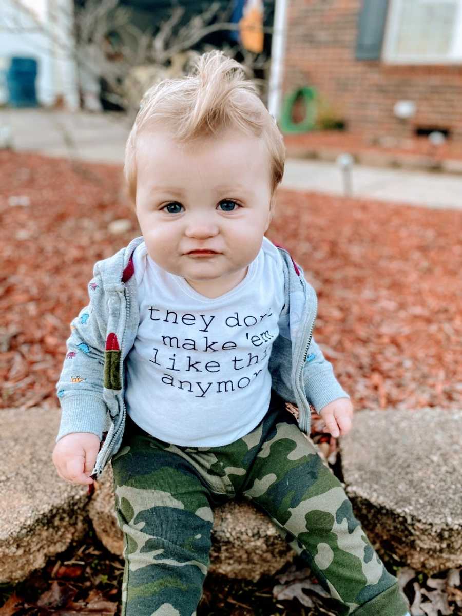 Little boy in foster care gets his photo taken with a shirt that says "they don't make 'em like this anymore"