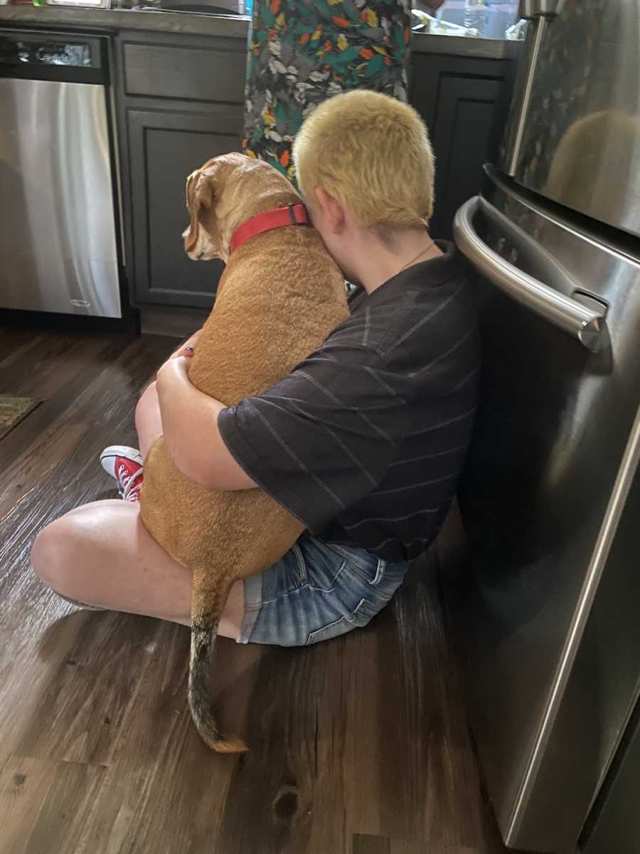 teenager with dog