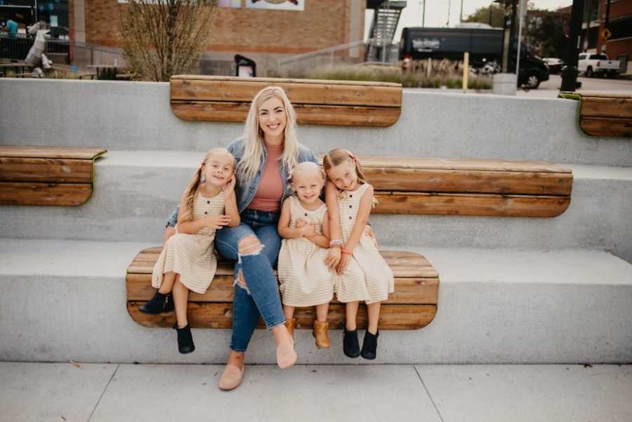 Woman posing with children